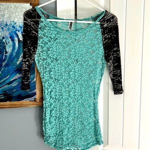Turquoise and black top